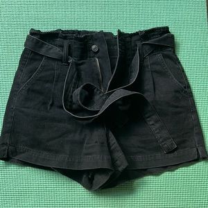 Black American eagle high rise paper bag shorts with tie waist.